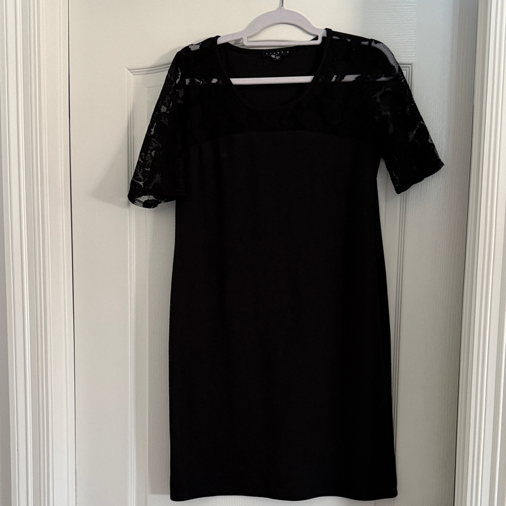 Tiana B. Elegant Black Mini Dress with Lace Accents